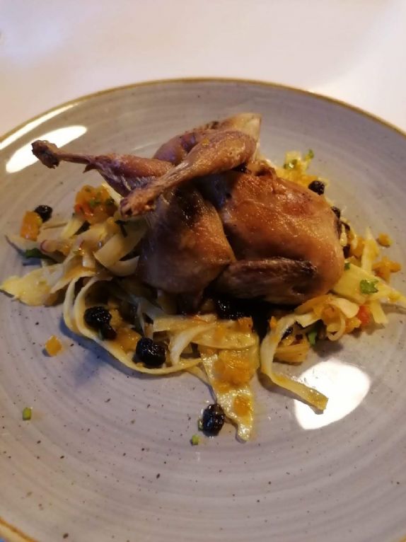 Quail confit with fennel, saffron, currants and preserved lemon